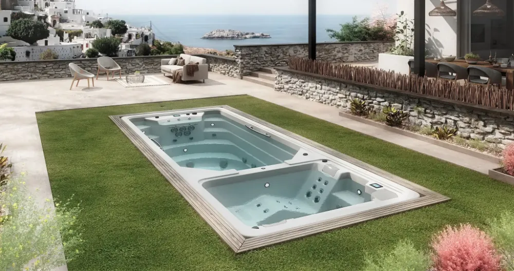 Εξωτερική πισίνα με τζακούζι Swimspa Duo Aquavia Spa σε κήπο